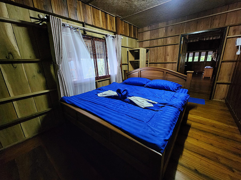 บ้านป่าโหล โฮมสเตย์ ห้องนอน